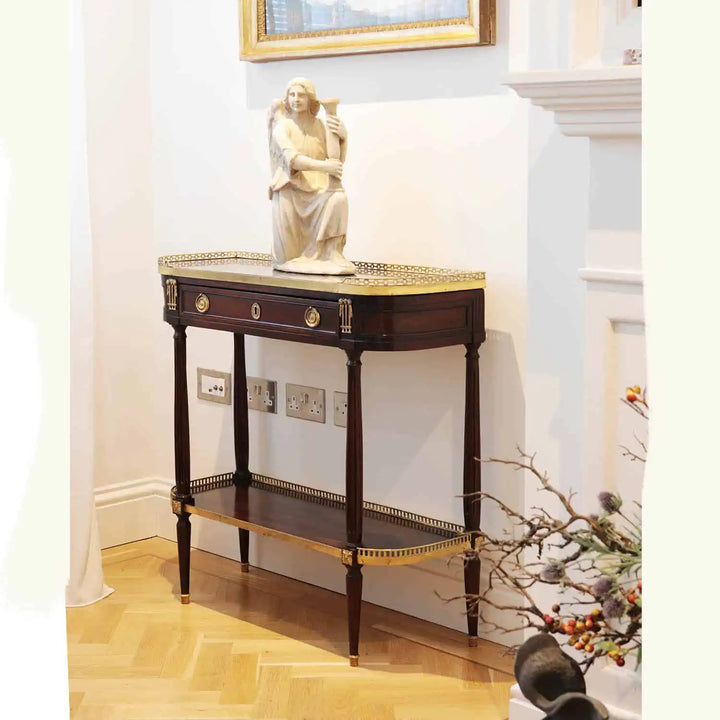 PAIR LOUIS XVI MAHOGANY CONSOLE DESSERTS with grey marble top, brass gallery, gilt handles, fluted legs, circa 1800.