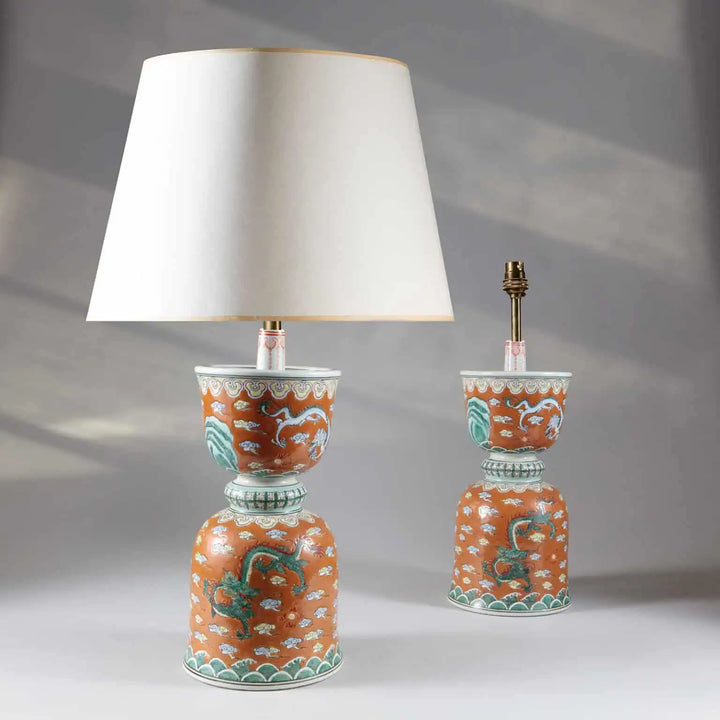 Pair of Chinese Porcelain Candlestick Stand Lamps with brown glaze and polychrome dragon design, circa 1965.