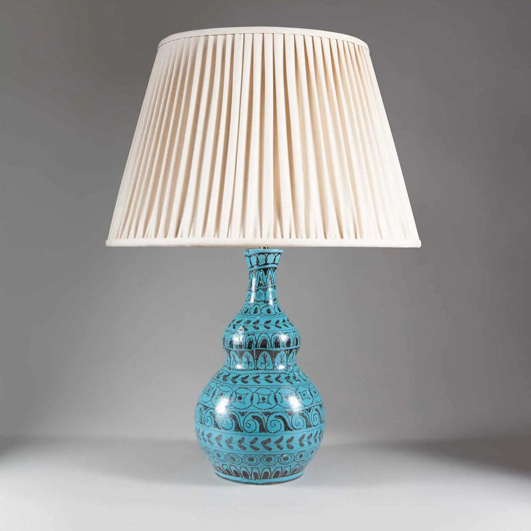 Turquoise Double Gourd Vase converted to table lamp with patterned Italian ceramic base and white pleated lampshade.