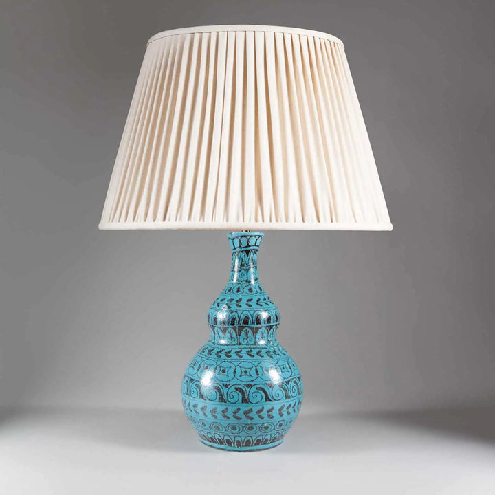 Turquoise Double Gourd Vase converted to table lamp with patterned Italian ceramic base and white pleated lampshade.