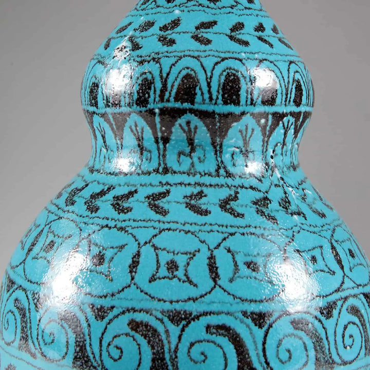 Turquoise Double Gourd Vase showing intricate black patterns on a glossy blue ceramic surface, made in Italy table lamp base.