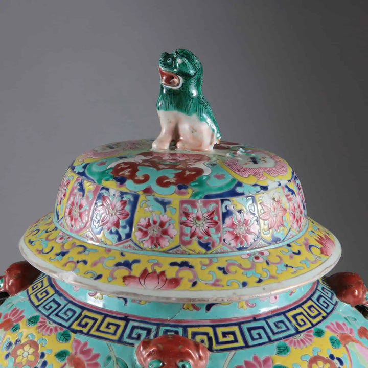 Close-up of large Qing Dynasty vase cover with intricate floral patterns and green imperial guardian lion by Collection EE20