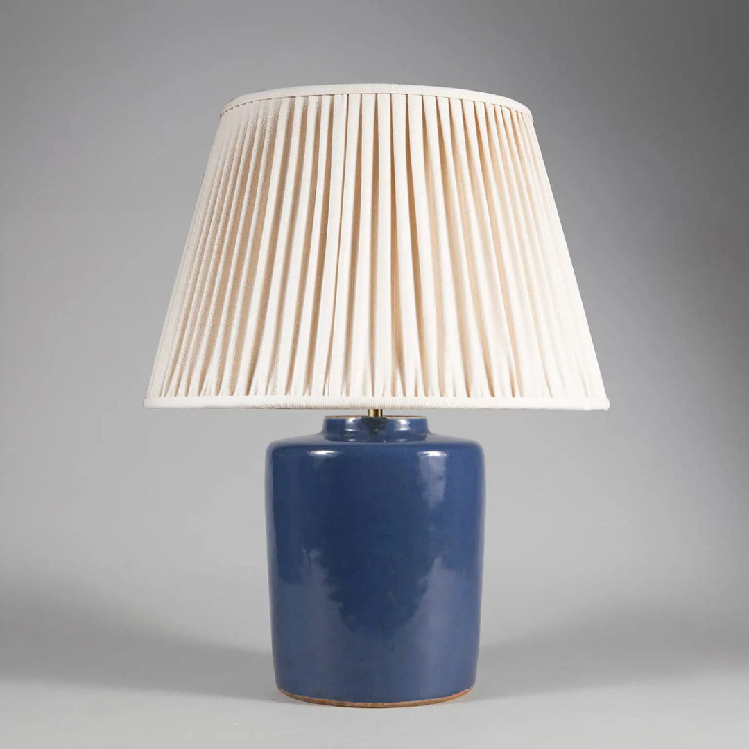 Powder Blue Chinese Table Lamp with a ceramic vase base and pleated cream fabric shade, elegant bedside or living room lighting.