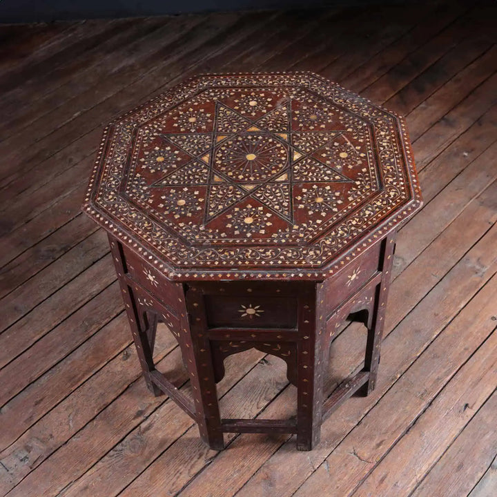 Hoshiarpur Folding Octagonal End Table with intricate bone inlay floral and geometric patterns on dark wood.