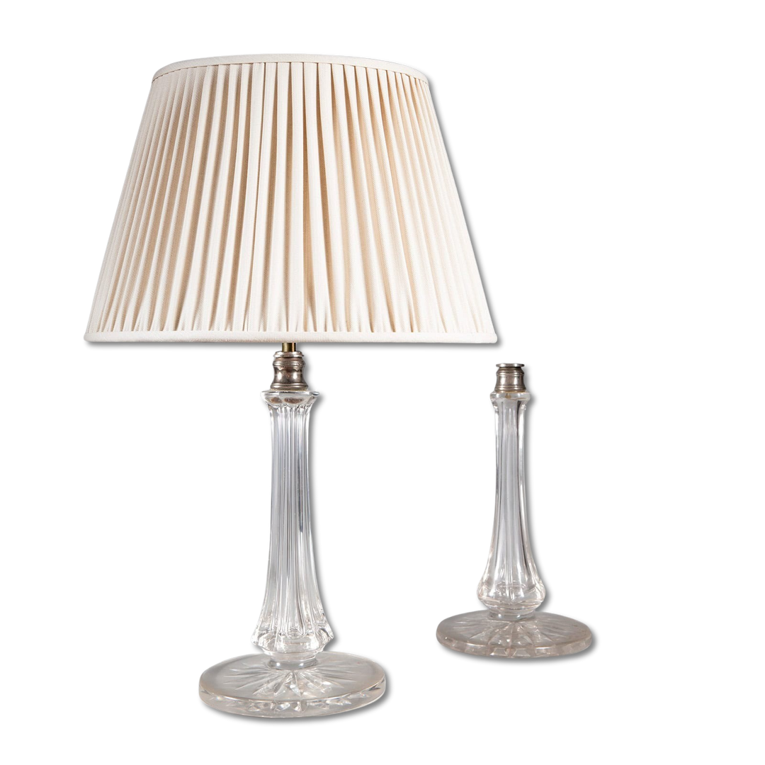 Pair of Clear Glass Column Lamps by Osler featuring clear glass bases with silvered metal fittings, one with a pleated cream shade.