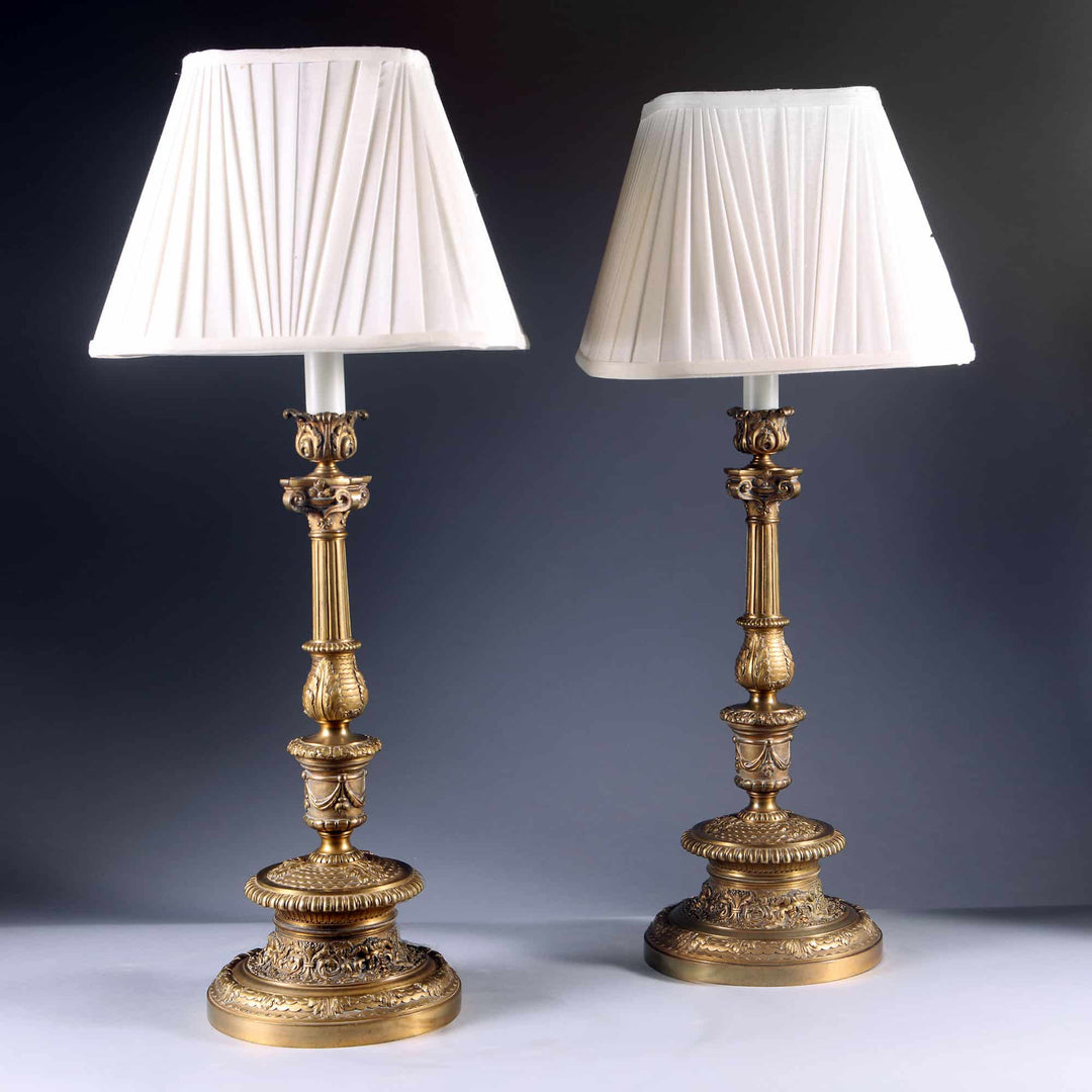 A pair of 19th Century gilt bronze table lamps