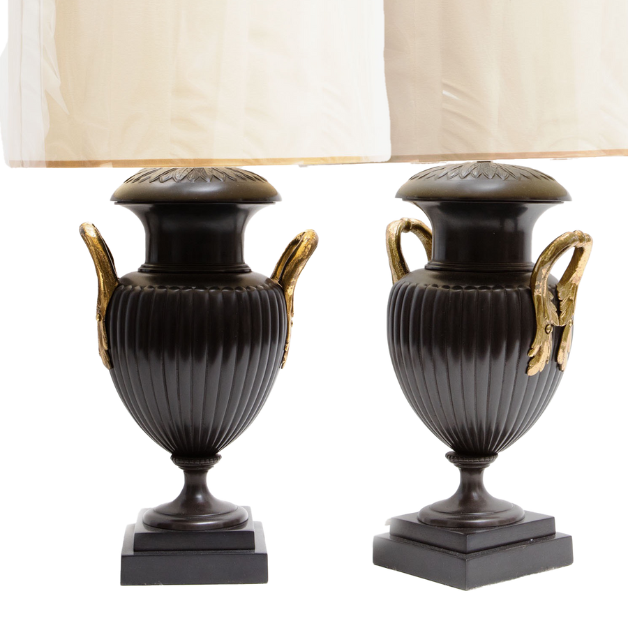 Pair of Neo-Classical Bronze Urn Lamps with leaf decoration and lacquered brass handles, circa 1970, England, 29 inches tall.