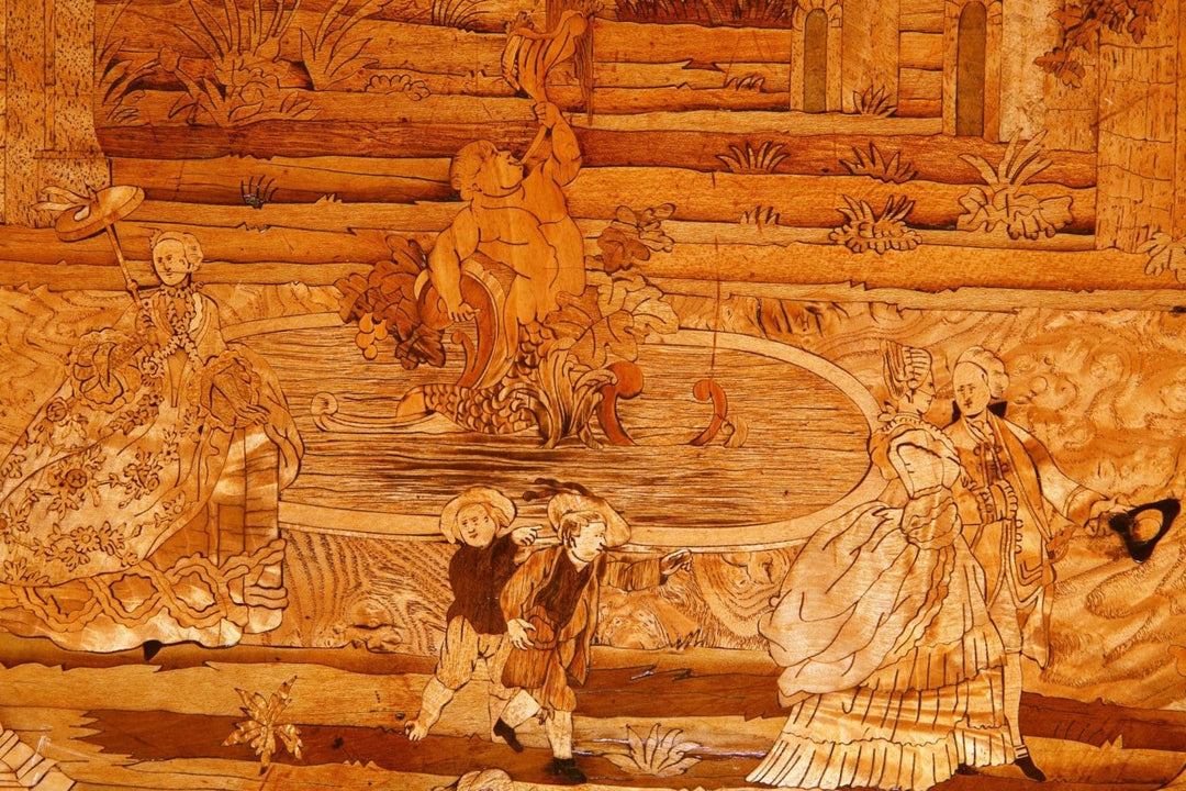 Exceptional 19th Century Marquetry Table with intricate fountain scene and court figures in contrasting woods and gilt bronze accents.