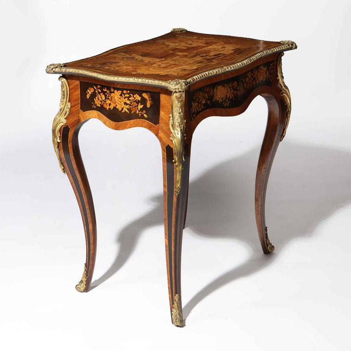 Exceptional 19th Century Marquetry Table with intricate marquetry, gilt bronze mounts, and curved cabriole legs.