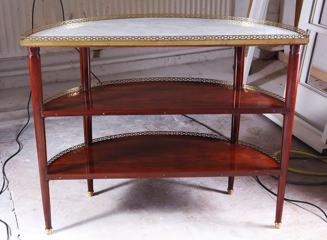 Louis XVI Style Acajou Moucheté Demi Lune Console Desserte with white marble top and brass details.