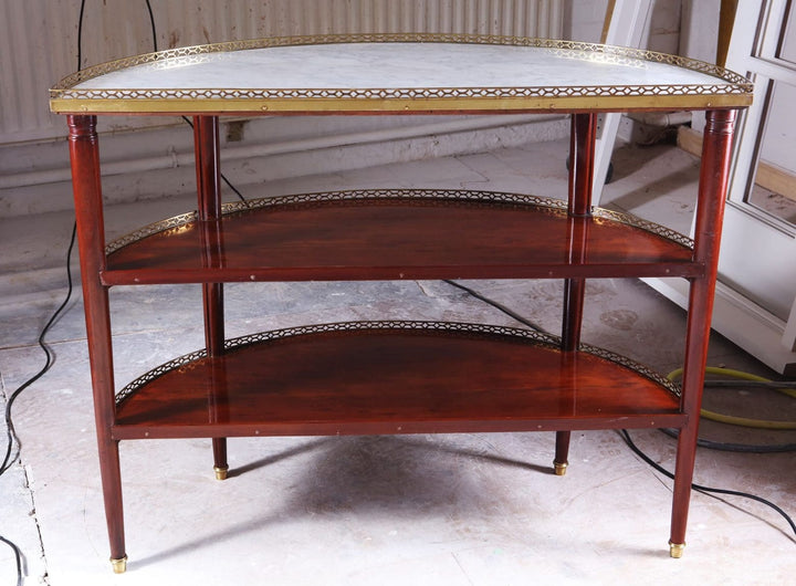 Louis XVI Style Acajou Moucheté Demi Lune Console Desserte with white marble top and brass details.