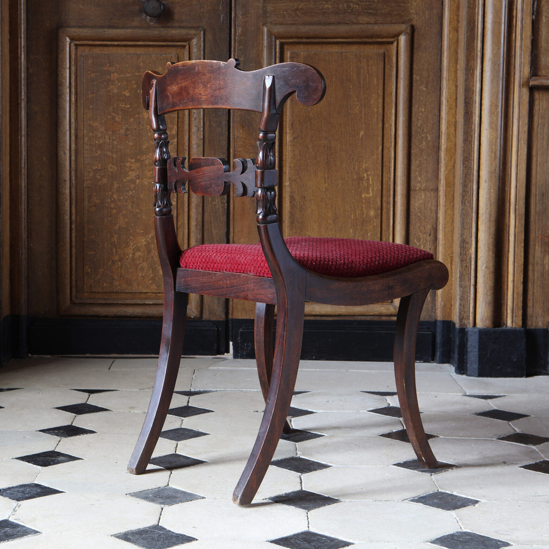 Regency side chair with mahogany frame and red upholstered seat by Collection EE30 on patterned tile floor