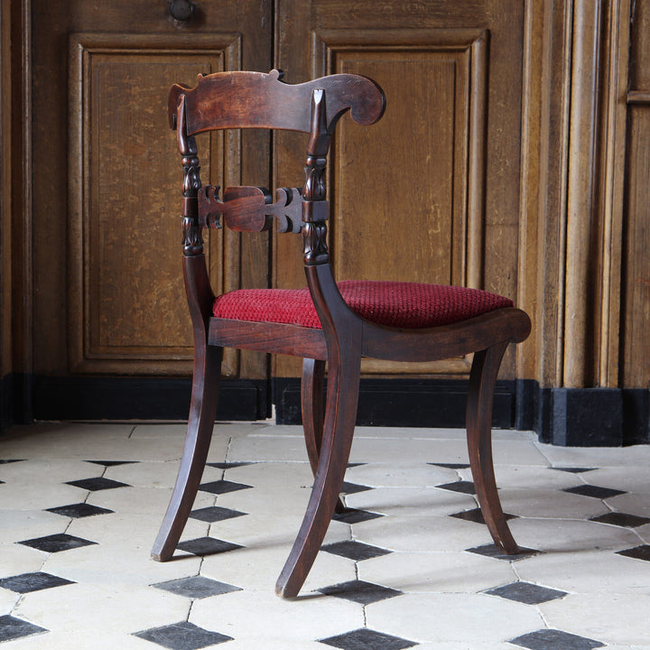 Regency side chair with mahogany frame and red upholstered seat by Collection EE30 on patterned tile floor