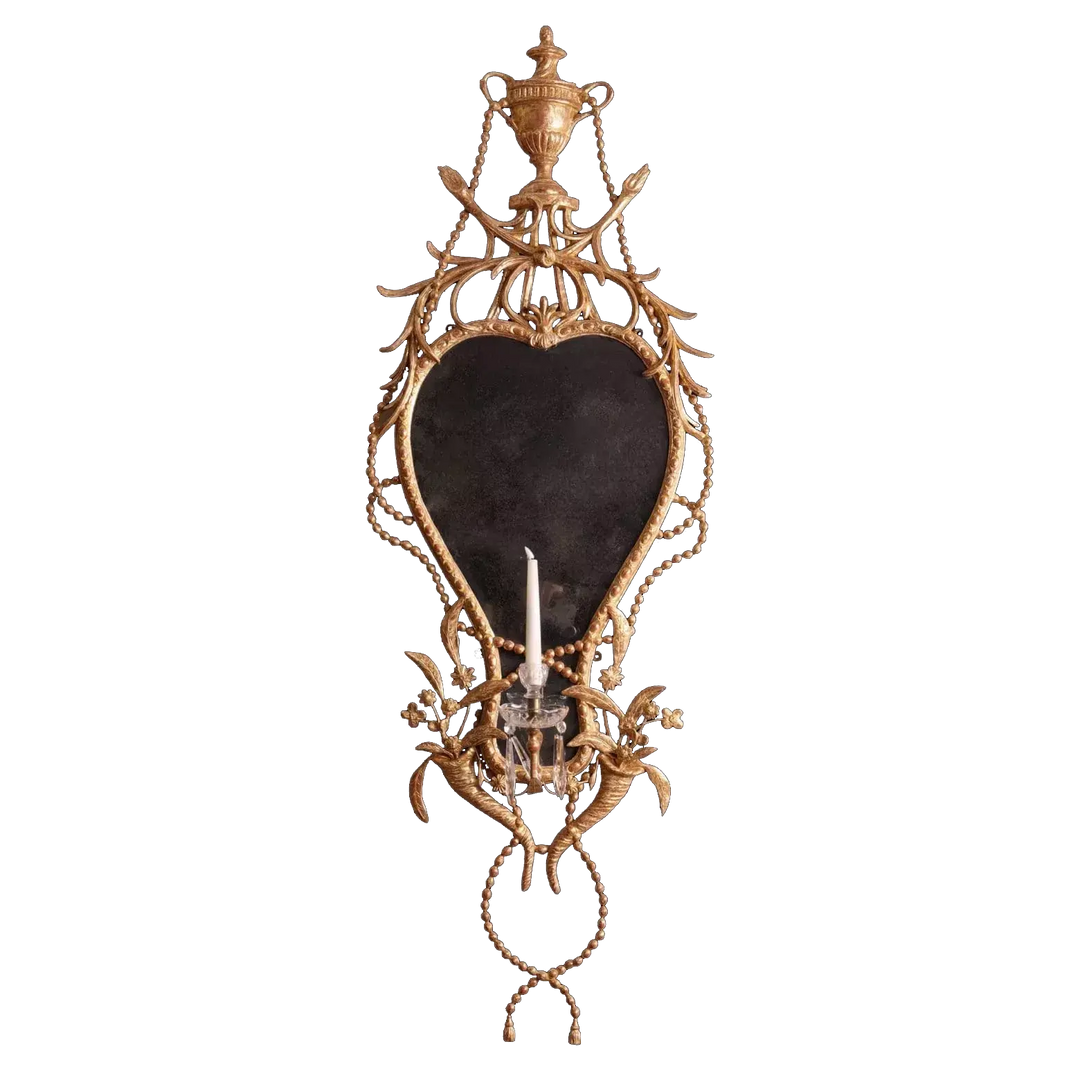 18th Century Gilt Carton-pierre Wall Mirror with intricate floral motifs and a single candle arm, circa 1775.