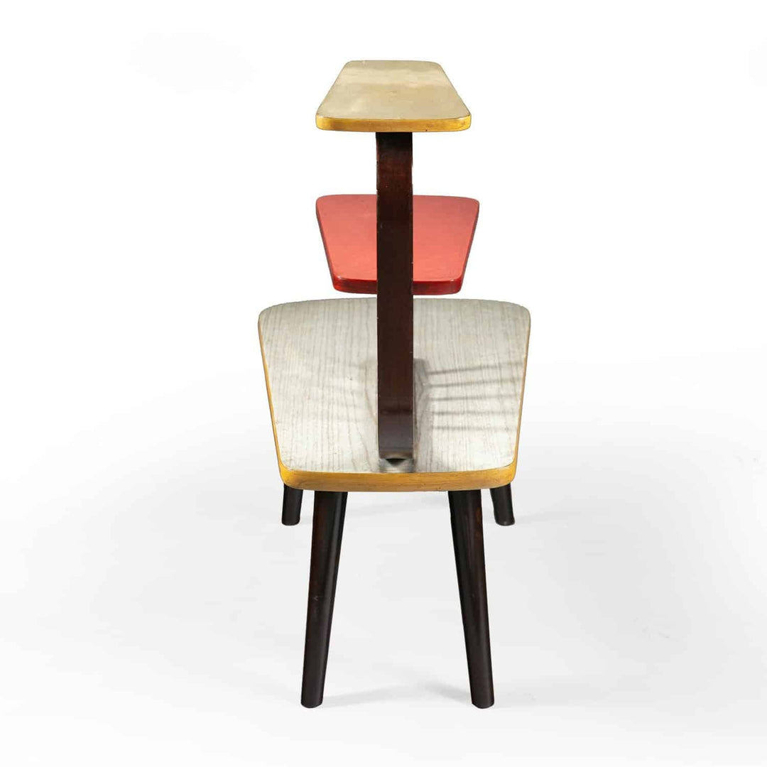 Pair of mid century three tier end tables with bent wood and polychrome Formica tiers on turned tapering legs.