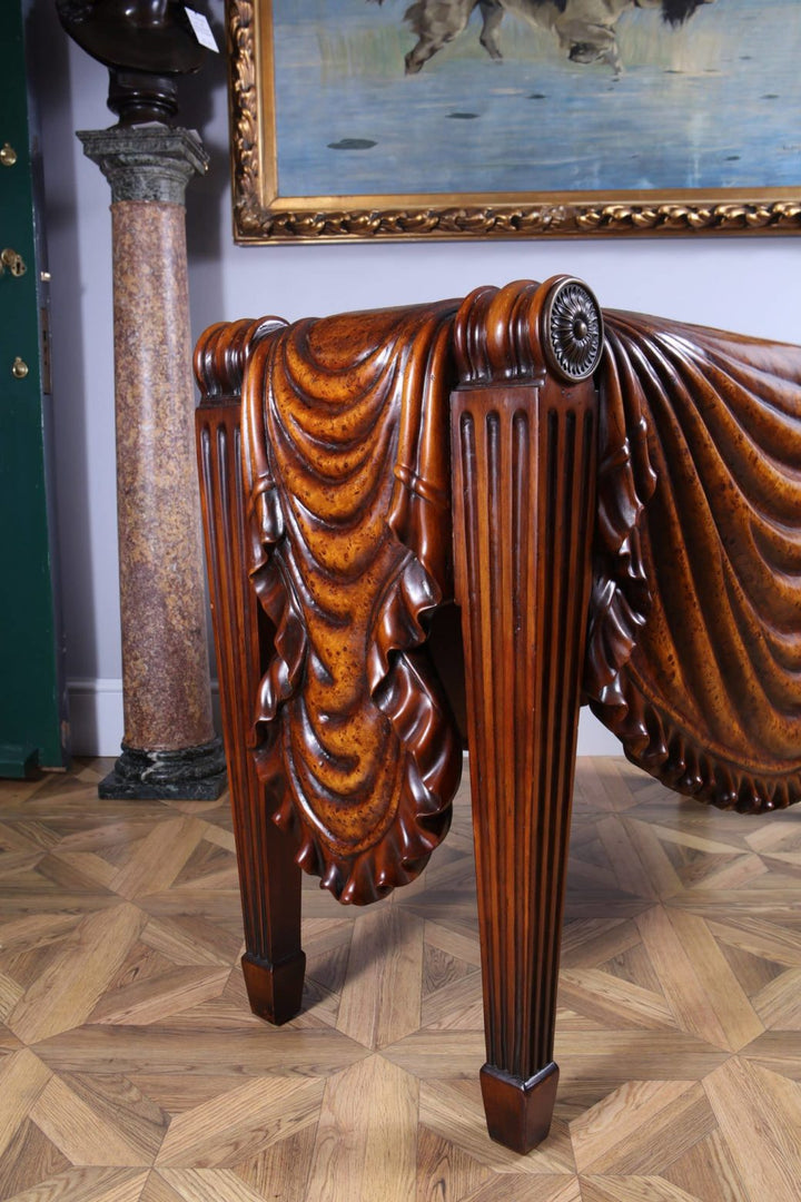 Centre Table after a Design By Charles Heathcote Tatham featuring carved wooden draped detailing and fluted legs.