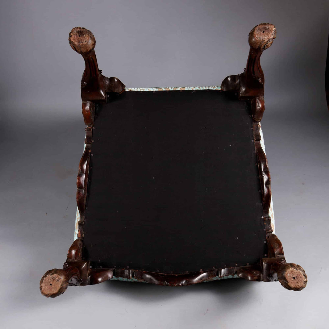 Underside view of mahogany side chair in George II style by Collection CK20 showing carved wooden frame and legs