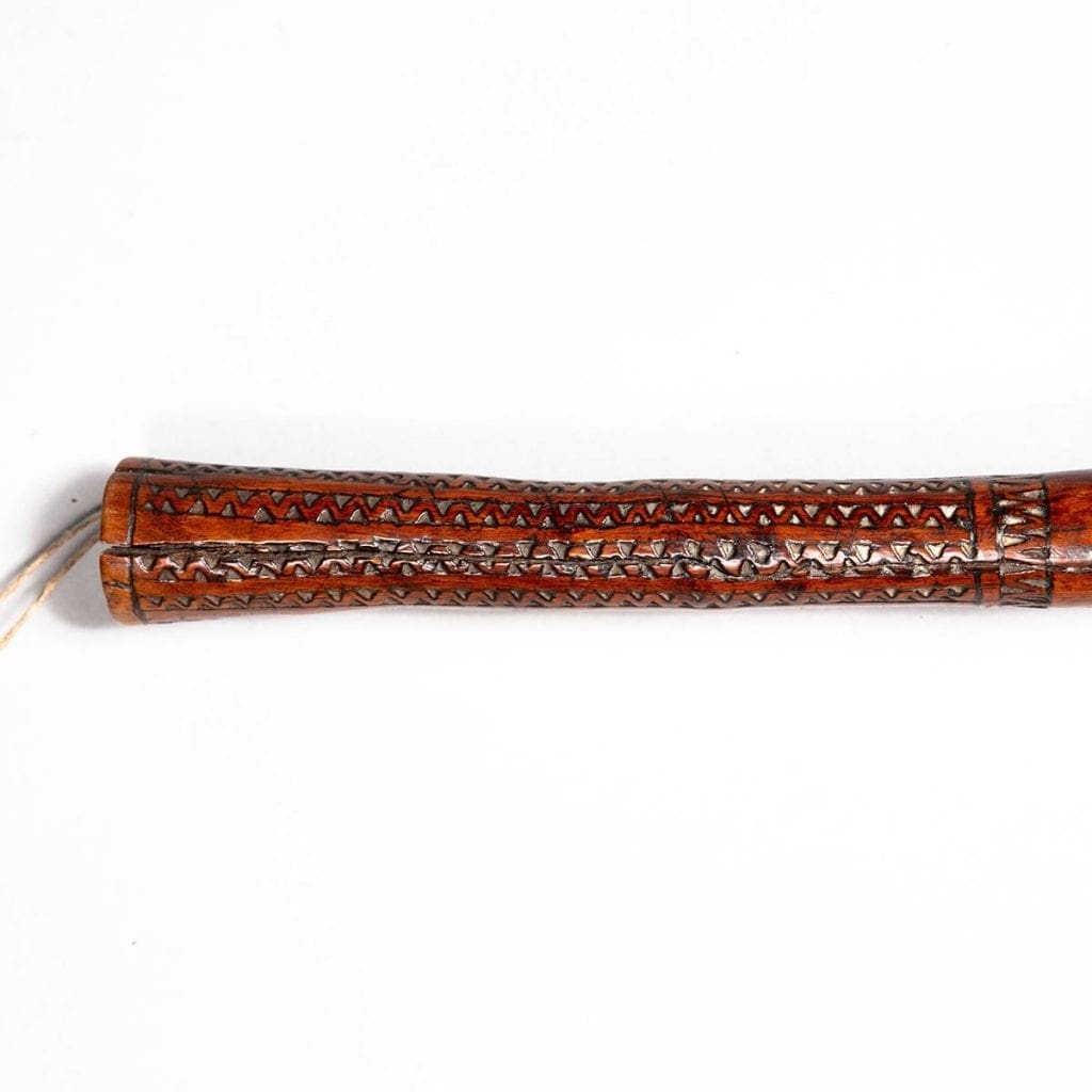 Fijian Throwing Club handle with intricate tava tava parallel line carvings on polished wood from circa 1850 Fiji.
