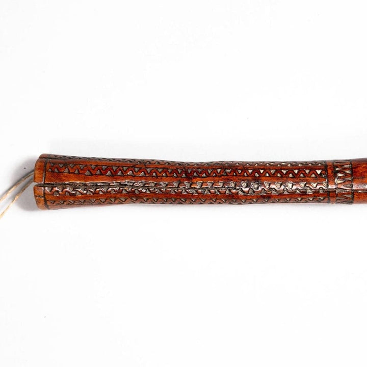 Fijian Throwing Club handle with intricate tava tava parallel line carvings on polished wood from circa 1850 Fiji.