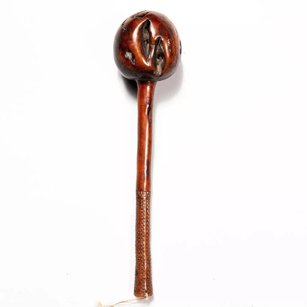 Fijian Throwing Club with round bulbous head and carved handle from Fiji, circa 1850, 42 cm tall and 9 cm diameter.