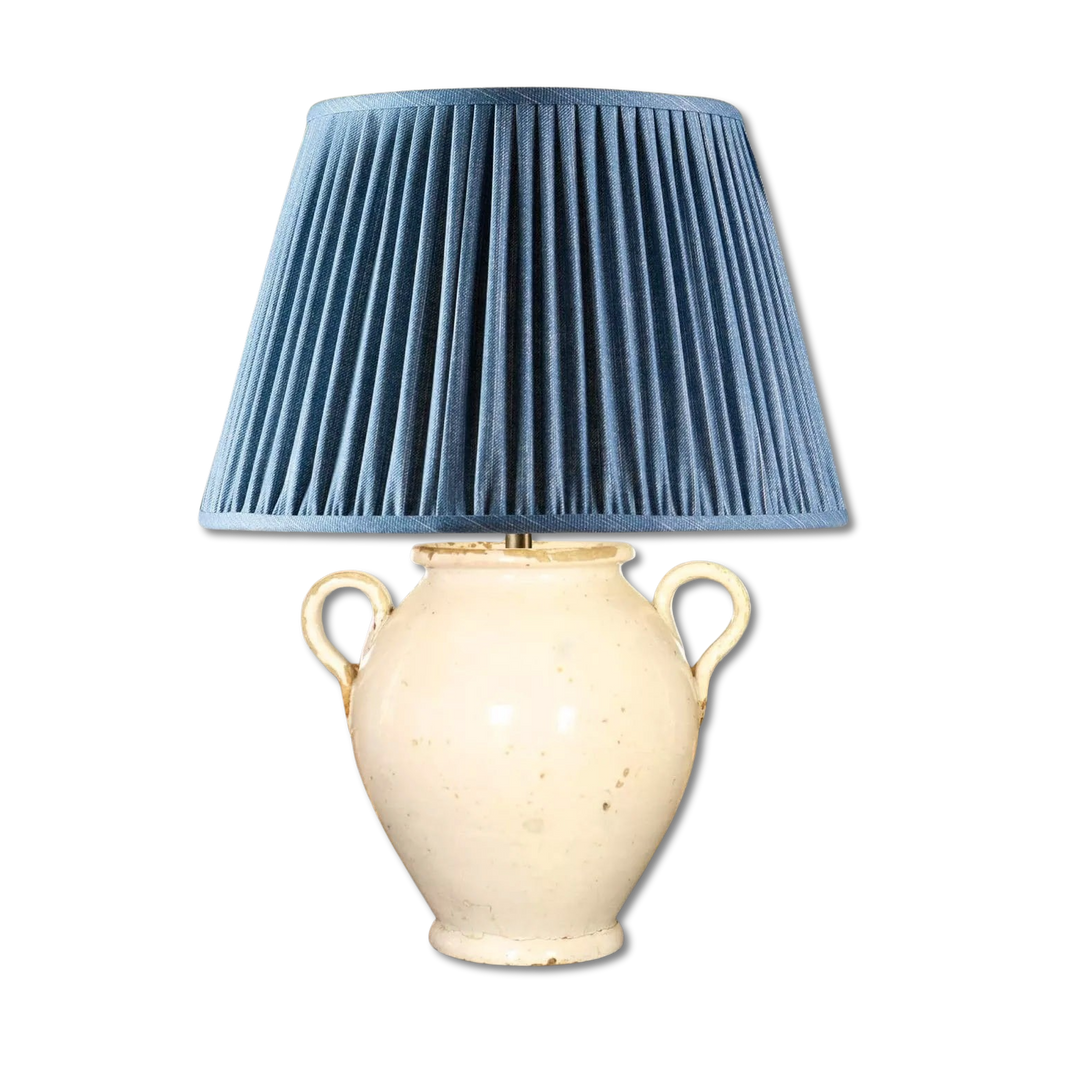 Italian 17th Century Vase Mounted as a Lamp with cream glaze and rustic blue pleated shade on earthenware base.