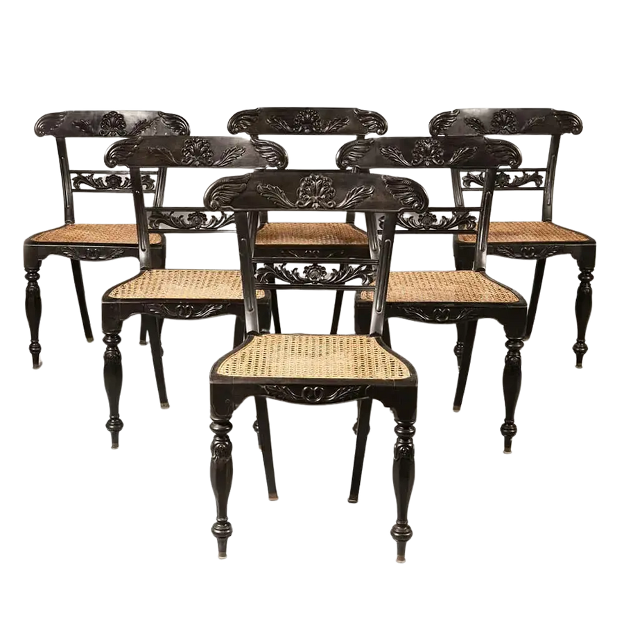 Set of six Anglo Indian ebony side chairs with caned seats and carved details by Collection EE30