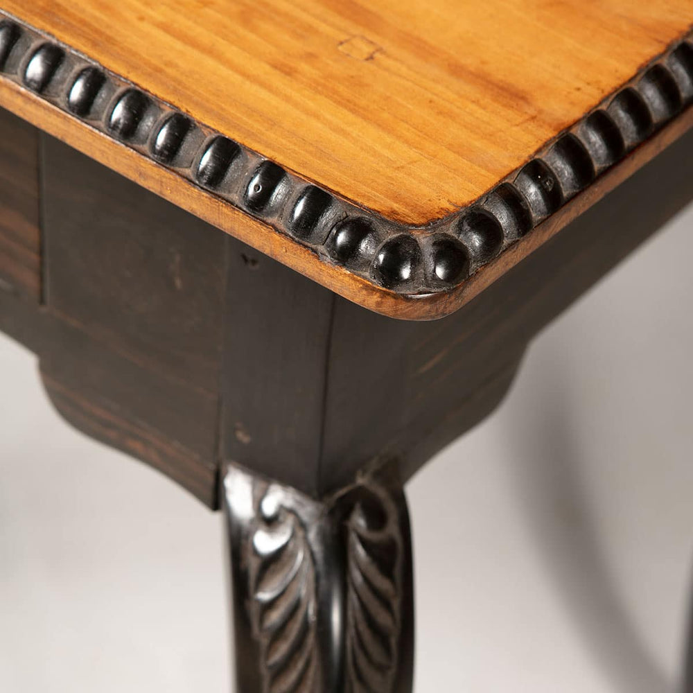 Pair of Antique Ceylonese Side Tables with solid satinwood tops, ebony cabriole legs, and carved foliate details.