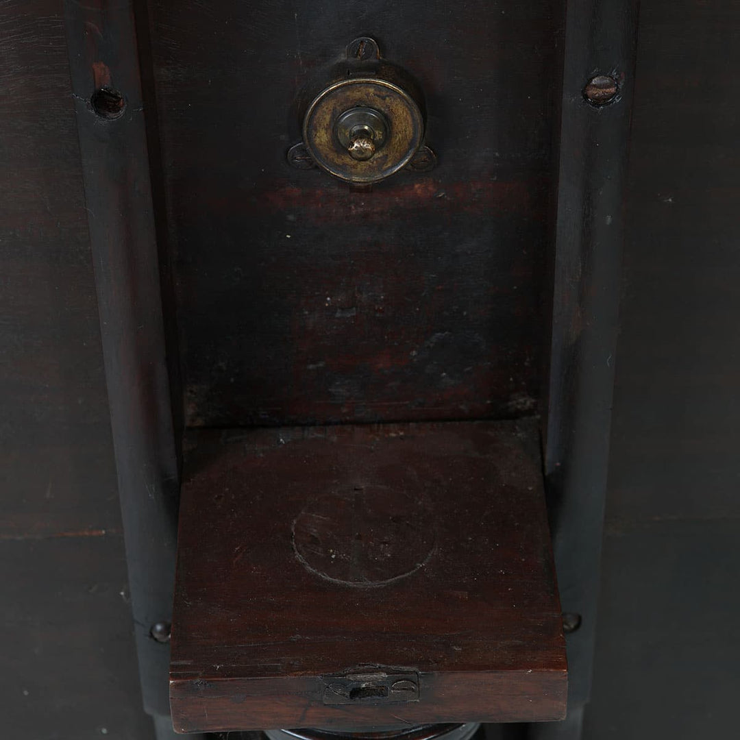 Georgian Mahogany Circular Tilt Top Tripod Table underside showing wooden frame and brass locking mechanism.