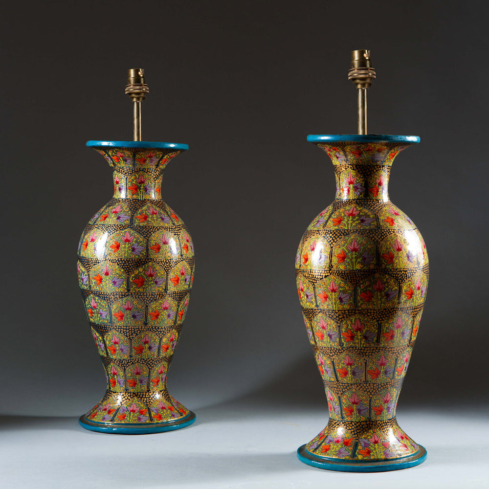 Pair of Kashmiri Papier Mâché Lamps with intricate floral lacquer design and blue rims, mounted as table lamps.