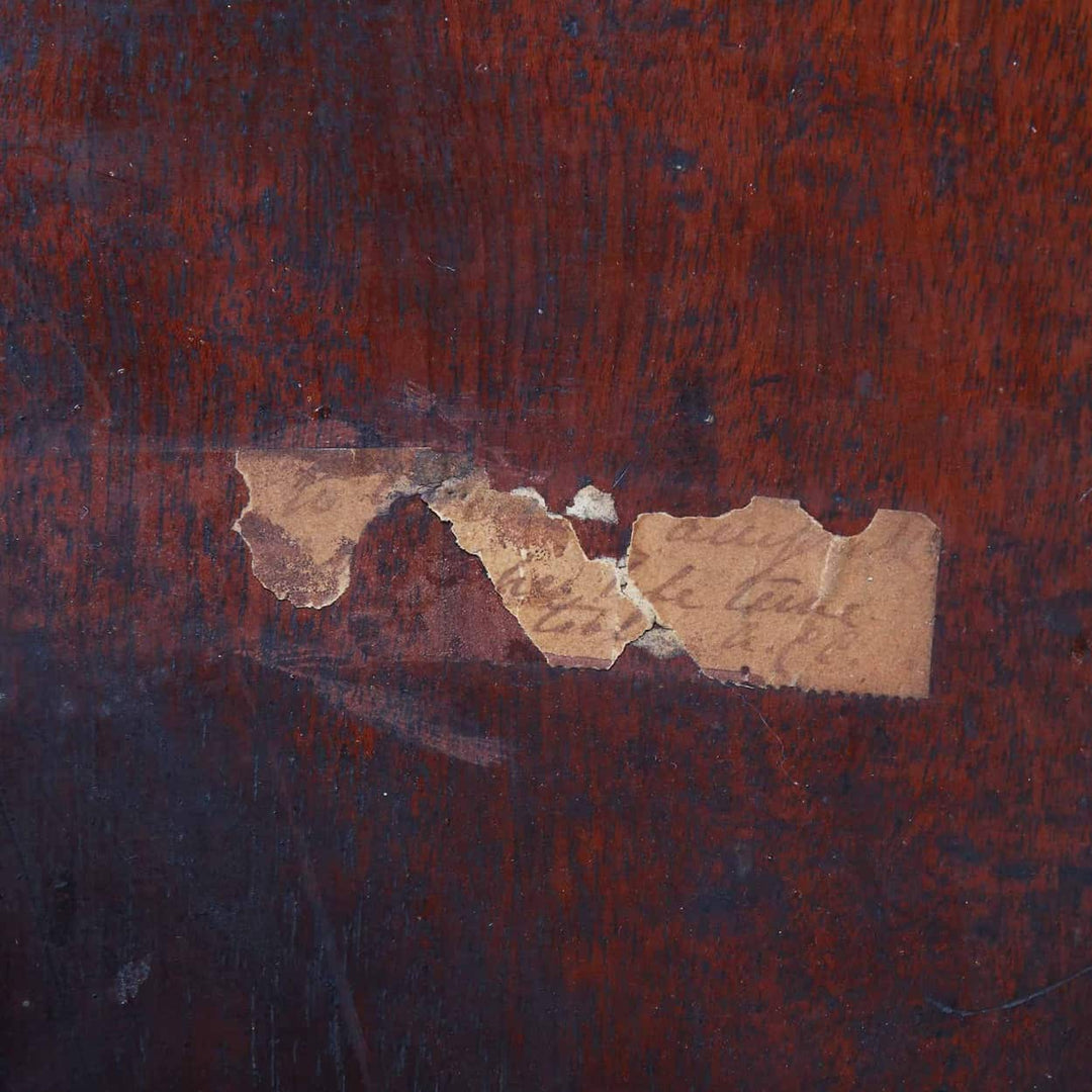 Tripod Table Attributed to James Allan of Fredericksburg showing worn wood surface with old torn paper label.