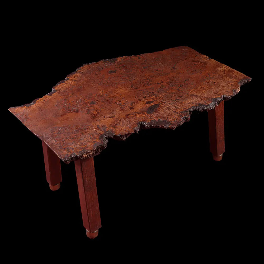 Coffee Table Handcrafted From Solid Burr Walnut With Live Edge featuring rough-cut walnut top and elegant oak legs with brass castors.