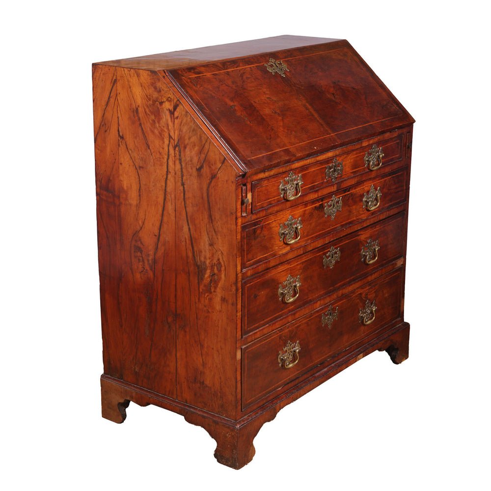 Early 18th Century Figured Walnut Bureau Cabinet with brass handles and book matched walnut veneer on bracket feet.