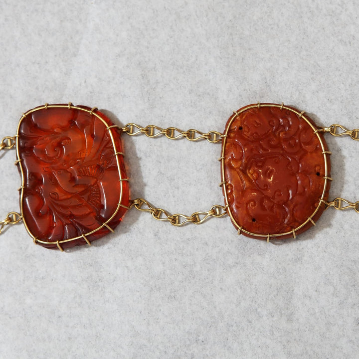 Chinese carved amber necklace with gold mountings by Nicholas Wells Antiques, showcasing traditional craftsmanship circa 1880.