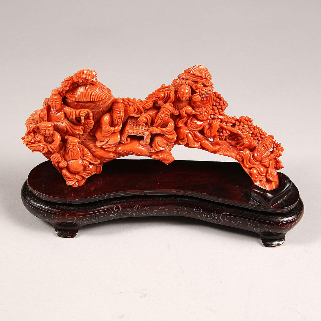 Fine 20th century Chinese precious coral carving depicting figures in leisure, offered by Nicholas Wells Antiques.