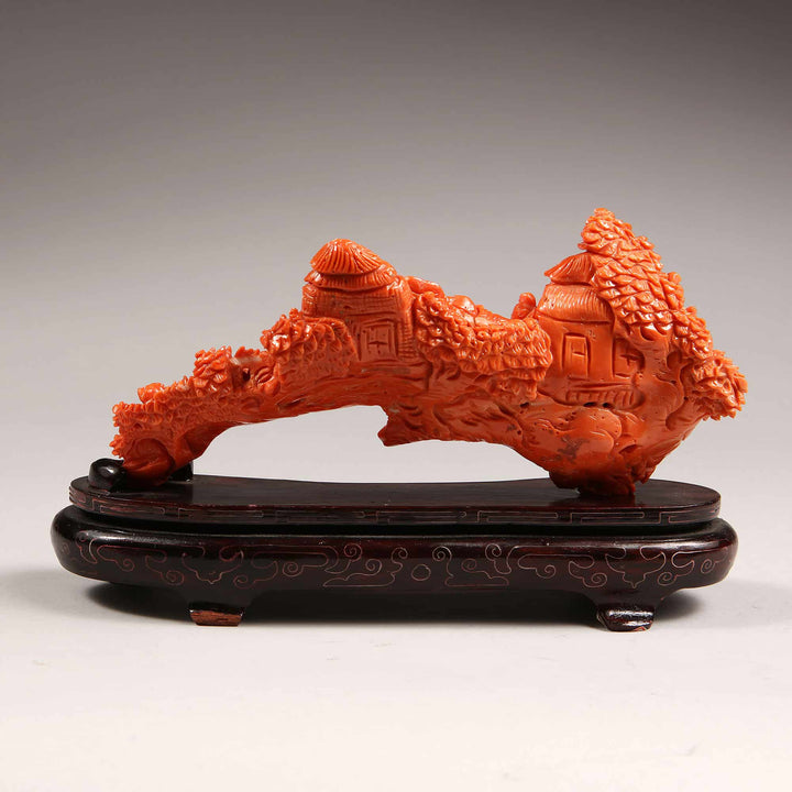 Chinese 20th century precious coral carving of figures relaxing, displayed on wood base by Nicholas Wells Antiques