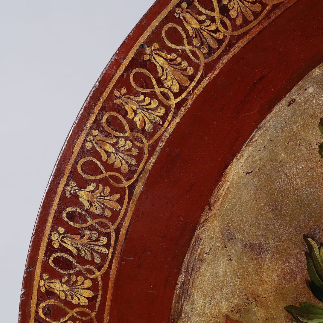 Japanned Tilt Top Occasional Table circular top with gilt classical motif and floral bouquet on silver-gilt ground.