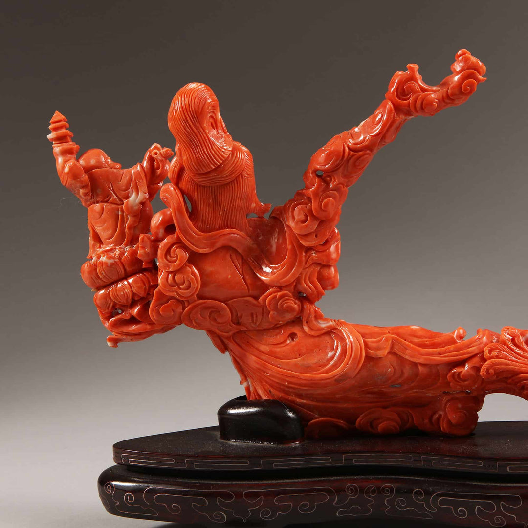 Chinese carved precious coral reclining Guanyin figure with attendants by Nicholas Wells Antiques detailed craftsmanship