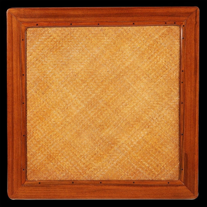 HUANGHUALI SQUARE MEDITATION STOOL CHANDENG with soft cane seat and square wooden frame in warm golden brown finish.