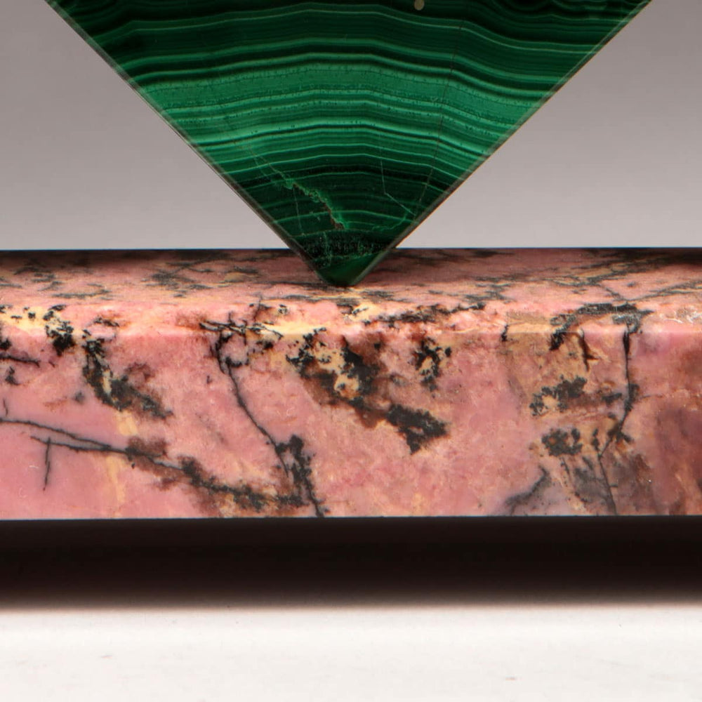 Close-up of polished green malachite and pink rhodonite stones on an Art Deco Imhof desk clock by Nicholas Wells Antiques