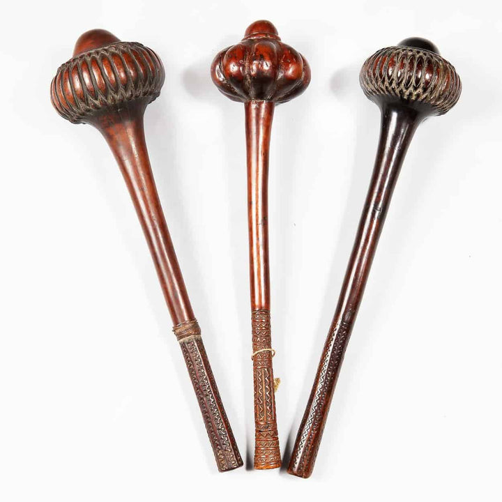 Three wooden Ula Fijian War Club ethnographic Oceanic throwing clubs with carved handles and round heads.