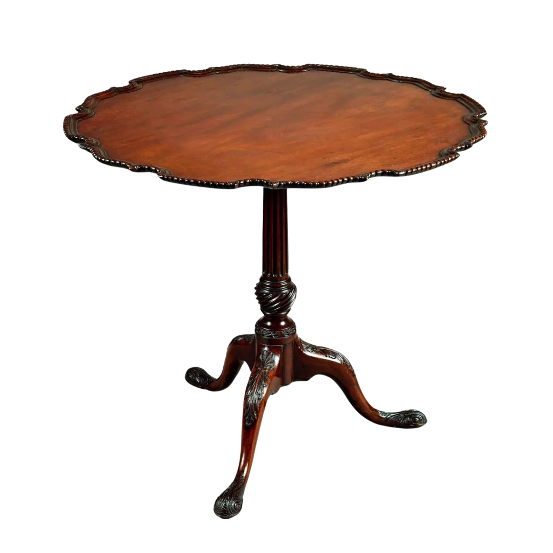 George III Mahogany Tripod Table with scalloped pie crust top and carved cabriole legs circa 1765.