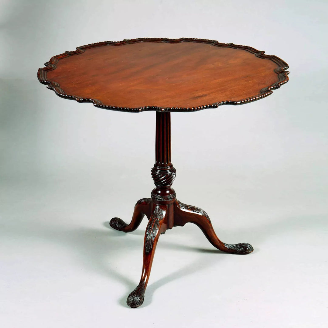 George III Mahogany Tripod Table with scalloped pie crust top and carved cabriole legs circa 1765 England.