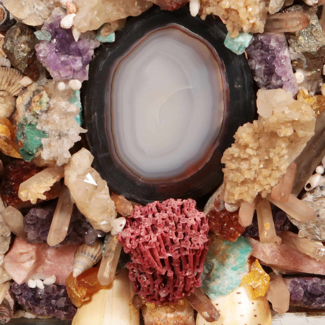 Vintage Crystal and Shell Grotto Mirror with agate, shells, corals, stones, and fossils on giltwood frame.