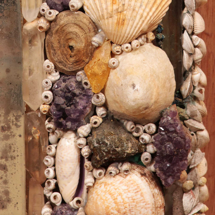 Vintage Crystal and Shell Grotto Mirror with shells, corals, stones, fossils, and polished agate on giltwood frame.