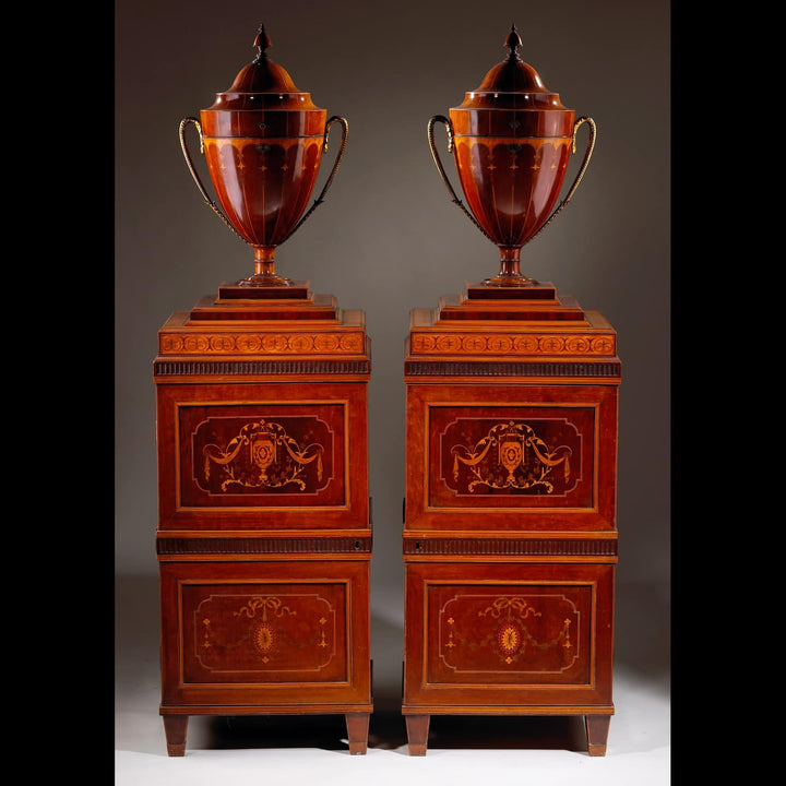 Pair of George III Sheraton Knife Urns on Stands, late 18th century English wooden urns with intricate inlay.
