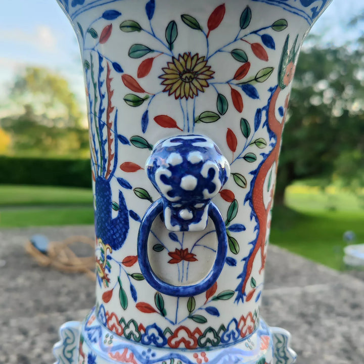 Samson Vase Mounted as a Table Lamp with intricate blue and red bird and floral ceramic patterns on wooden base.