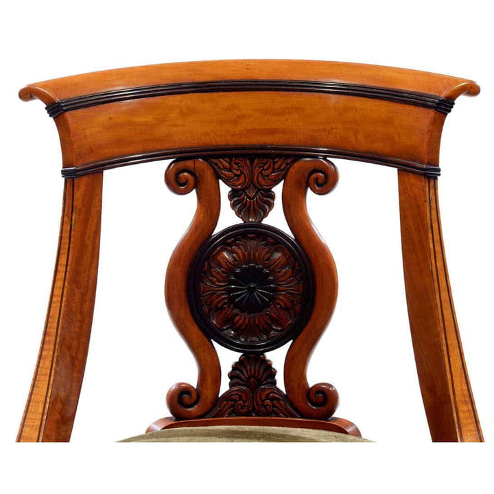 Close-up of a lyre-shaped back detail on a French Charles X satinwood chair from Collection CK20