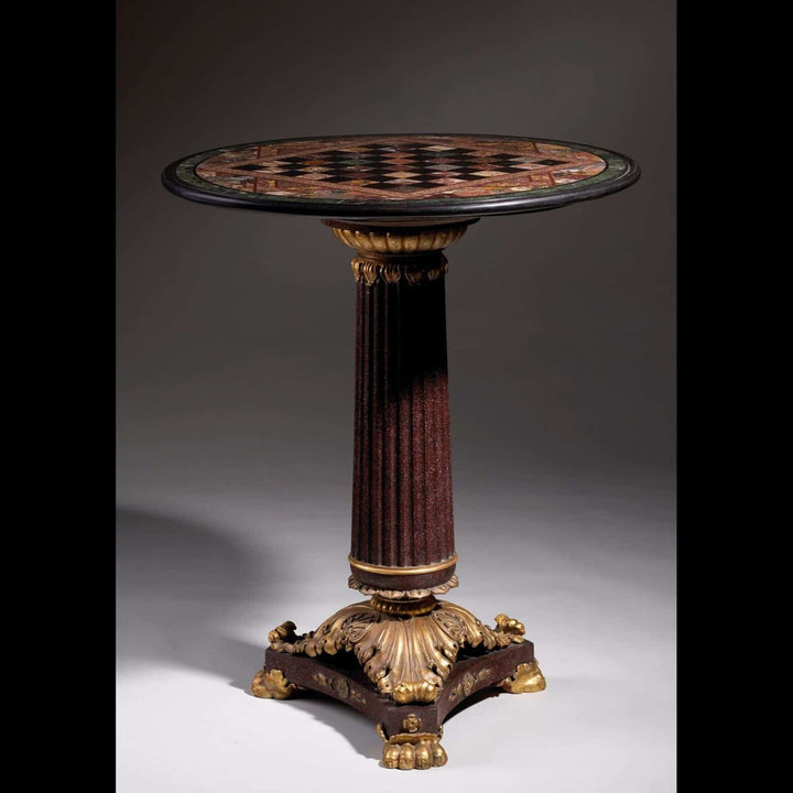 Specimen Marble Gueridon with early 19th-century specimen marble top on fluted faux porphyry and giltwood column base.