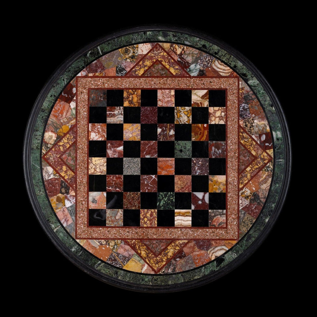 Specimen Marble Gueridon with intricate multicolored checkerboard marble top on a round base.