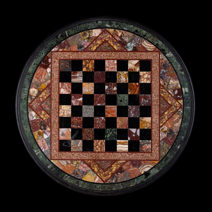 Specimen Marble Gueridon with intricate multicolored checkerboard marble top on a round base.